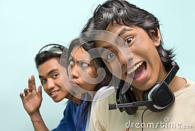 Merry Asian callcenter Stock Photo