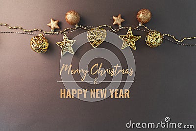 Merry Chrismas and Happy New Year, gold chrismas ball hanging on the background Stock Photo