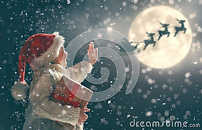 Girl with present at Christmas Stock Photo