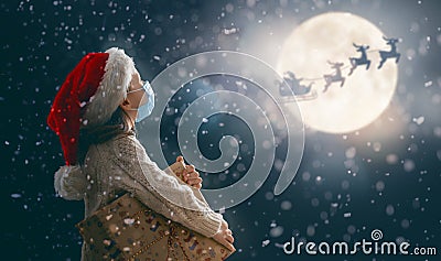 Girl with present at Christmas Stock Photo