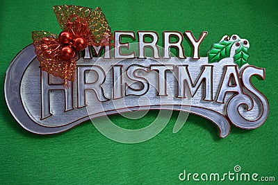 Merry Christmas on green background. Stock Photo