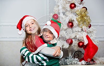 Merry christmas. Family holiday tradition. Children cheerful celebrate christmas. Kids christmas costumes santa and elf Stock Photo