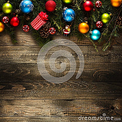 Merry Christmas Frame with real wood green pine and colorful baubles, Stock Photo