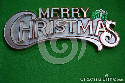 Merry Christmas on green background. Stock Photo