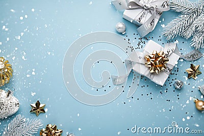 Merry Christmas and Happy Holidays greeting card, frame, banner. New Year. Christmas white, silver and golden ornaments and gifts Stock Photo