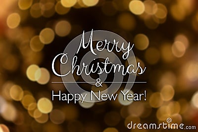 Merry Christmas and happy new year card. Blurry bokeh gold abstract background Stock Photo