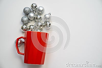 merry christmas and happy new year, festive red cup mug with silver sparkly baubles, imitation hot drink with steam Stock Photo