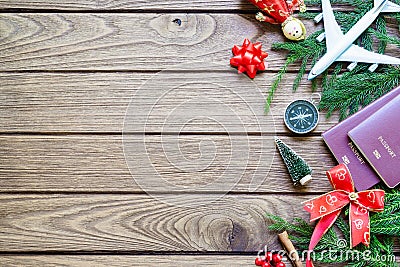 Merry Christmas and Happy new years travel concept background for winter trip on wood background , Travel with airplane top view Stock Photo