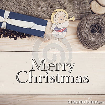 Merry Christmas inscription on a wooden background Stock Photo