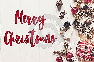 Merry christmas text, seasonal greetings card sign. flat lay. mo Stock Photo