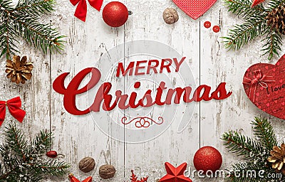 Merry Christmas text on white wooden surface. Christmas tree Stock Photo