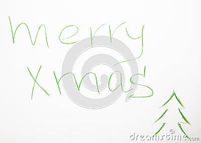 Merry Xmas hand writing with green mark on a white board Stock Photo