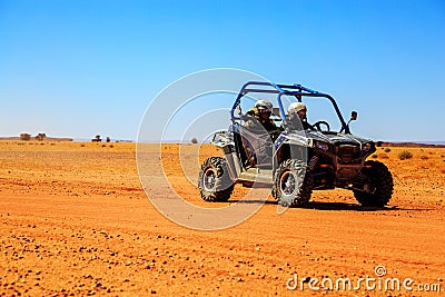 Merzouga, Morocco - Feb 23, 2016: Side view on blue Polaris RZR Editorial Stock Photo