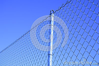 Mesh fence with a post Stock Photo