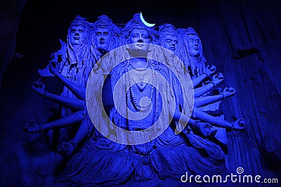 Mesmerising sculpture of Lord Shiva in a blue light during Ganpati Festival, Pune Stock Photo