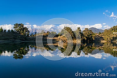 Mesmerizing reflection of Garhwal Himalayas in Deoria Tal or Lake. Stock Photo