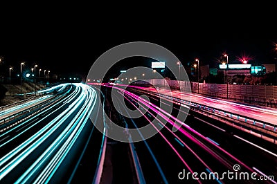 Mesmerizing shot of the dynamic high-speed colorful light trails on the street Stock Photo