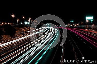 Mesmerizing shot of the dynamic high-speed colorful light trails on the street Stock Photo