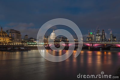 Mesmerizing shot of St. Paul's Cathedral and Millenium Bridge in London Editorial Stock Photo