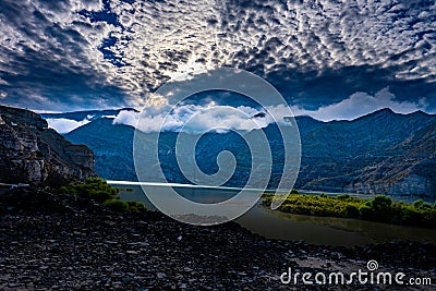 Mesmerizing view of Tortum Lake under a cloudy sky in Erzurum, Turkey Stock Photo
