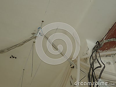 Unorganised wires on a building site Stock Photo