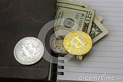 Mess on your desktop. Calculator, notebook, documents, Bitcoin, USD, paper money Stock Photo