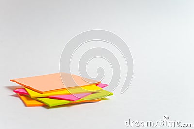 Message on paper with word Internet of Things on note stick on colorful book with laptop and a cup of coffee on glass table, top v Stock Photo