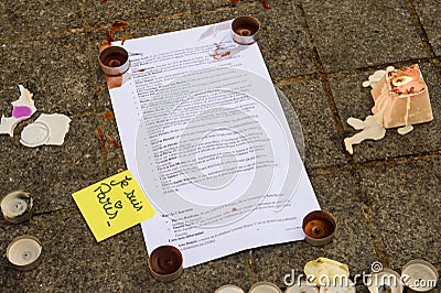 Messages, candles and flowers in memorial for the victims Editorial Stock Photo