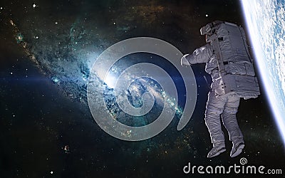 Messier 106 galaxy, planet, astronaut. Beautiful cosmic landscape. Science fiction Stock Photo