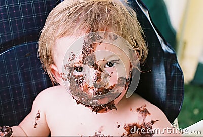 Messy Baby First Birthday Celebration Stock Photo