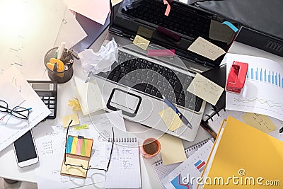 Messy and cluttered desk, light effect Stock Photo