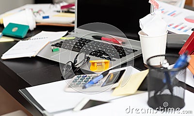 Messy and cluttered desk Stock Photo