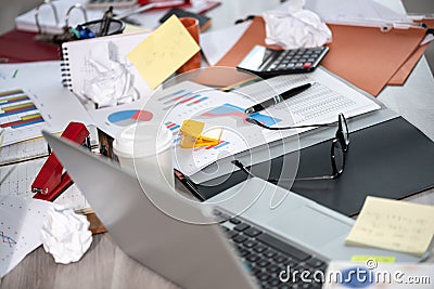 Messy and cluttered desk Stock Photo