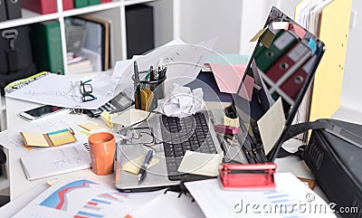 Messy and cluttered desk Stock Photo