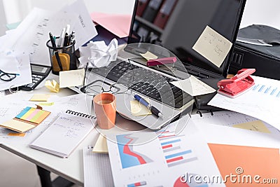 Messy and cluttered desk Stock Photo