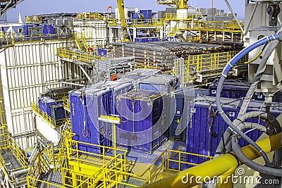 Messy, congested desck of offshore oil & gas platform rig Stock Photo