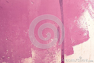 Messy paint strokes and smudges on an old painted wall. Pink, magenta color drips, flows, streaks of paint and paint Stock Photo