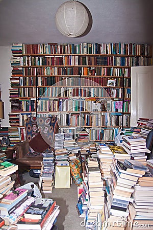 Messy room full of books Editorial Stock Photo