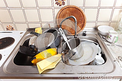 Dirty Dishes in a Sink for Washing Up. Stock Image - Image of left ...