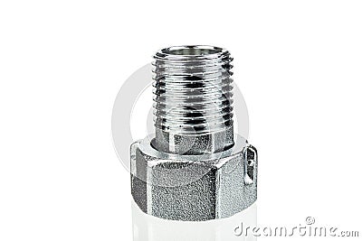 Metal adapter with nut and thread close-up on a white background. Stock Photo