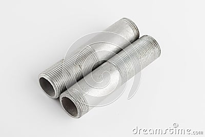 Metal adapter of plumbing couplings on a white background. Stock Photo