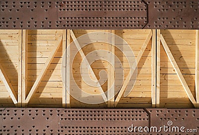 Metal beams and wooden boards Stock Photo