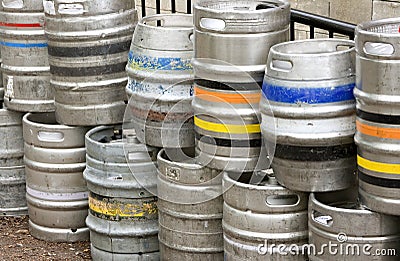 Metal beer kegs stacked up Stock Photo