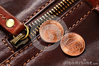 Zipper fastener and penny Stock Photo