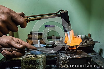 Metal casting process with red high temperature fire in metal Stock Photo