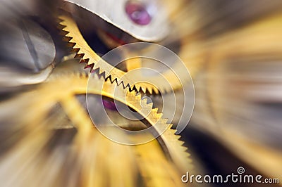 Metal Cogwheels in clock mechanism , abstract sun beams, Concept Movement is life, Teamwork , Idea Technology, Infinity. Macro Stock Photo