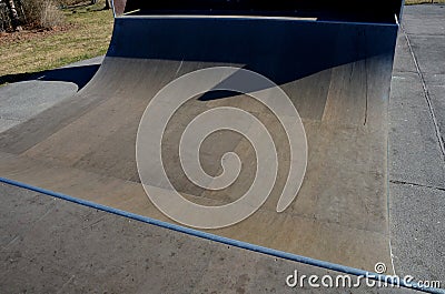 Metal construction ramp for skateboarding, serves as a platform for riding with an inline scooter or bmx bike free style. wooden b Stock Photo