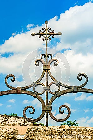 The metal cross on top of the Mission Concepcion church in San Antonio, Texas Stock Photo