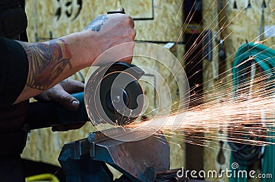 Metal cutting by grinder Stock Photo