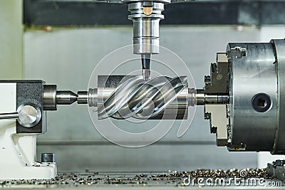 CNC milling machine work. metal worm gear processing Stock Photo